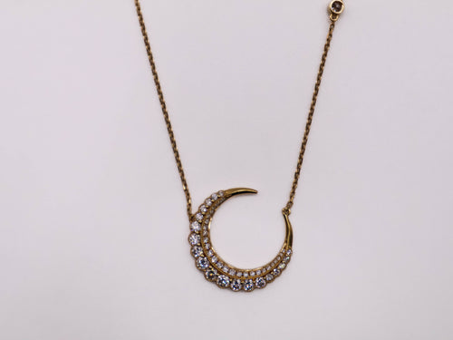 14 karat yellow gold crescent necklace